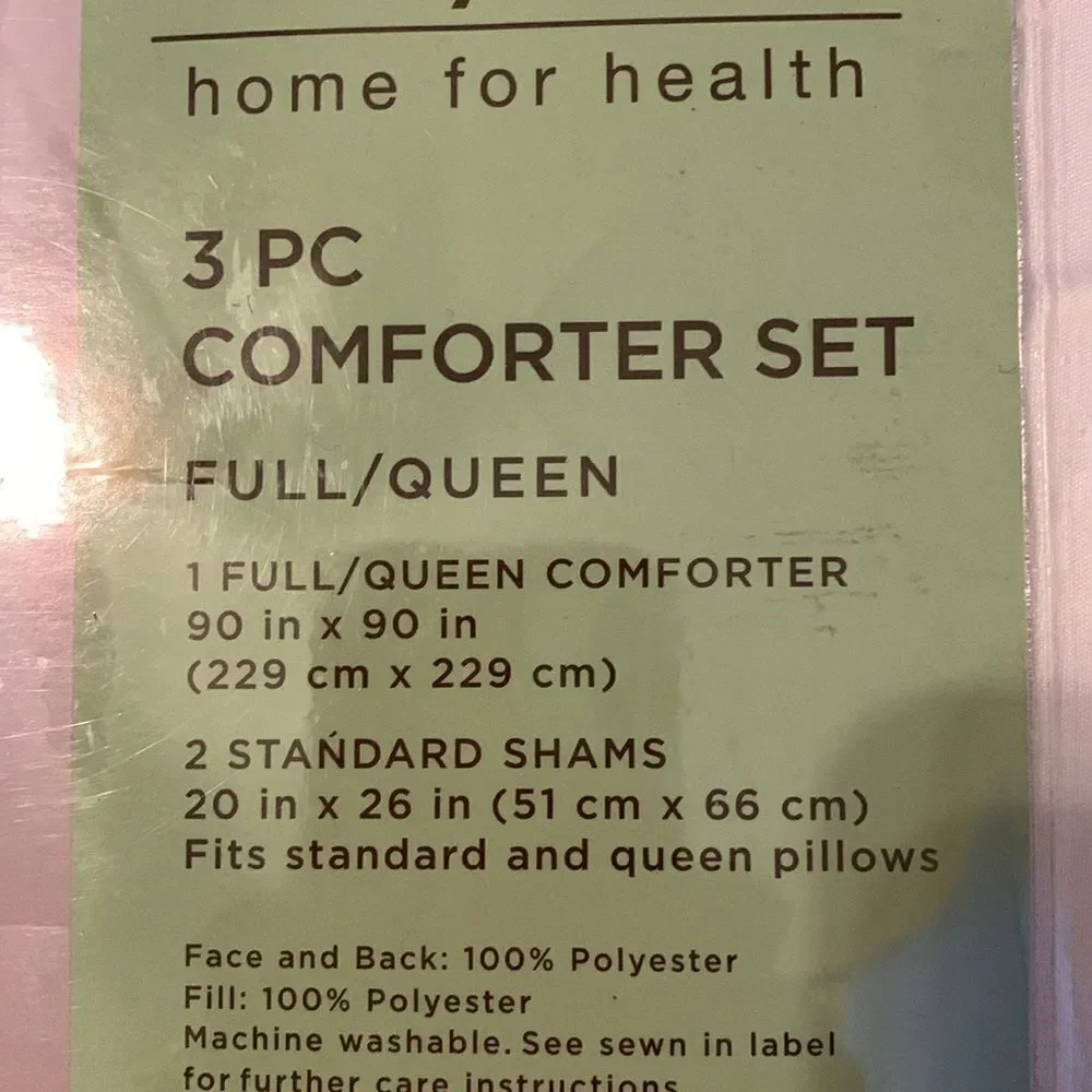 Three piece white antimicrobial odor control comforter set.  From Home Depot
